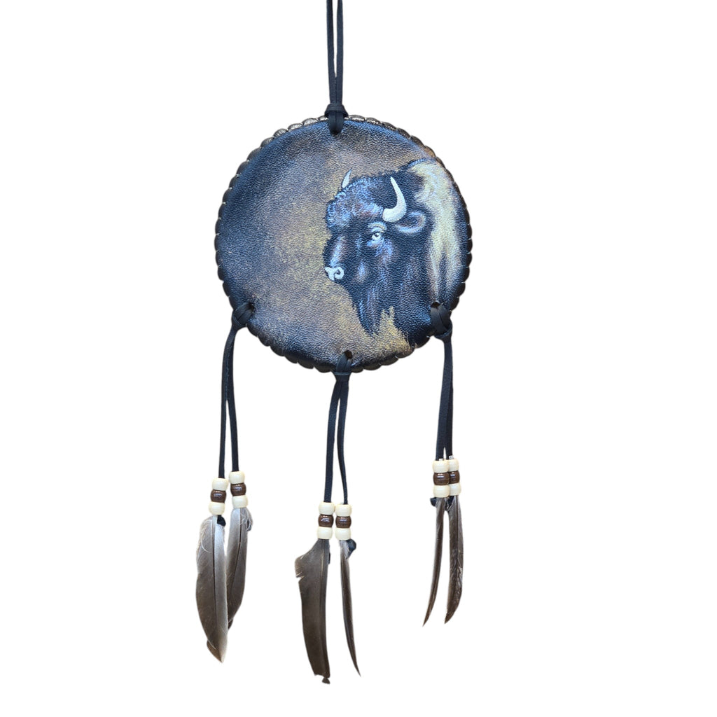 Hand Painted Leather Dream Catcher Featuring a Buffalo & Adorned with Leather Feathers and Beads.