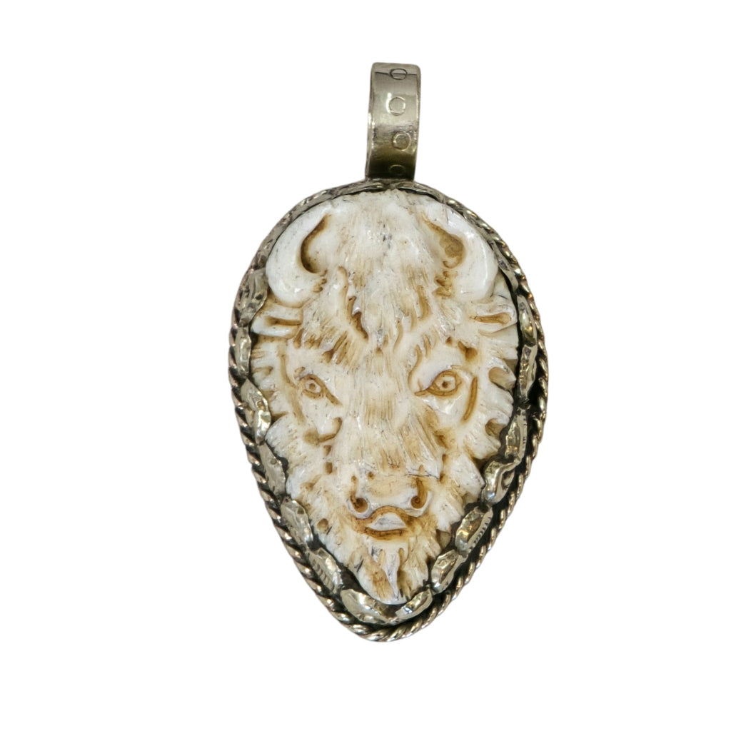 Hand-Carved Natural Bone, Buffalo Head Pendant, Featuring a Tibetan Silver Design