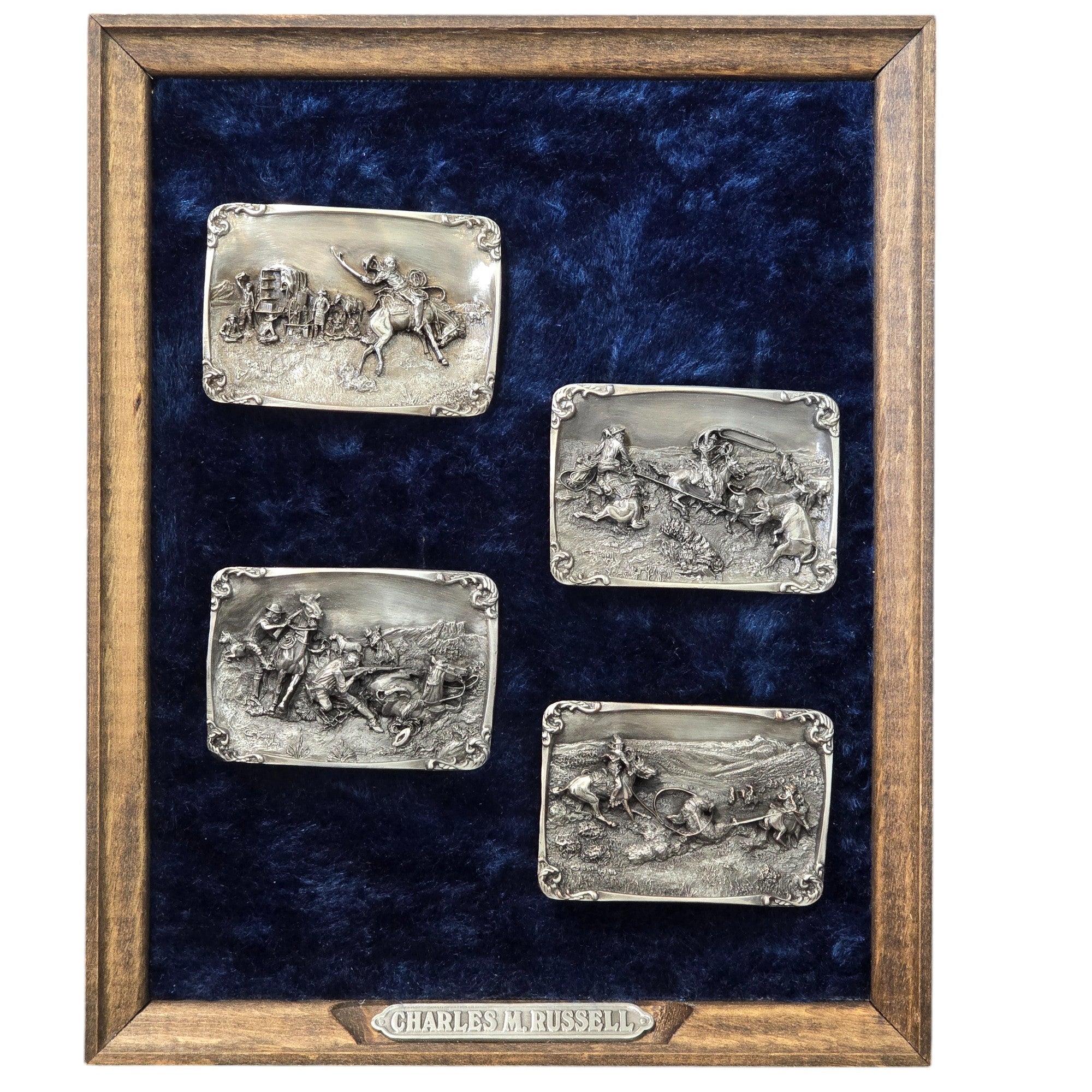 Charles M. Russell, Limited Edition Belt Buckles, Set of Four #197 of 5000