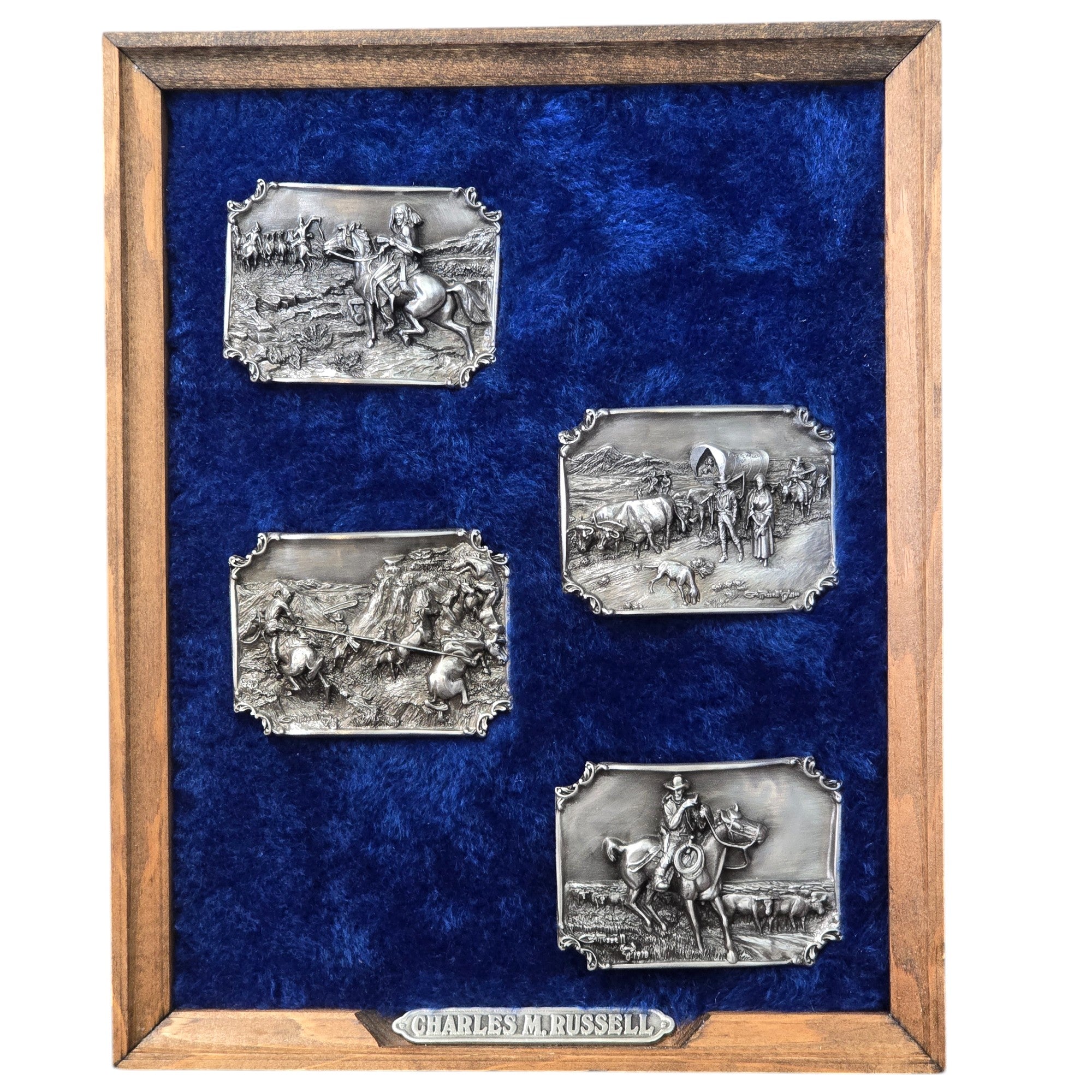 Charles M. Russell, Limited Edition Belt Buckles, Set of Four #190 of 5000
